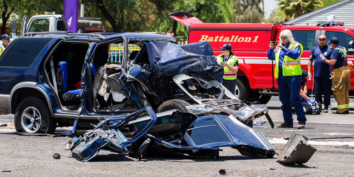 SUV collision with flatbed truck