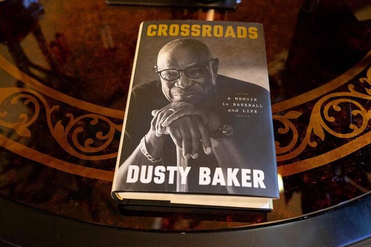 The book chronicles Baker's journey in baseball, from signing with the Atlanta Braves in 1968 against his father's wishes to being mentored by Hank Aaron, winning the 1981 World Series as a player, and capturing the 2022 World Series title as a manager.