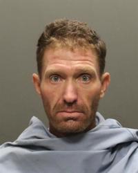 Man convicted in slaying of ex-girlfriend's companion outside of Tucson home