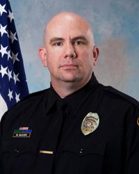 Ex-police officer in prostitution probe surrenders state certification