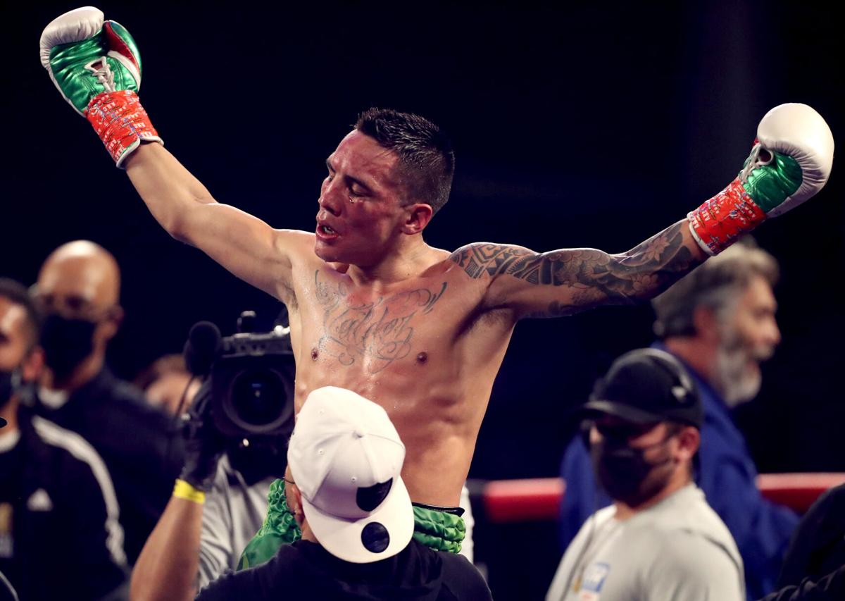 Oscar Valdez keeps WBC Super Featherweight belt with ...