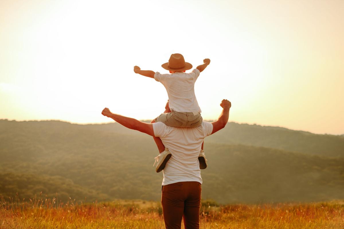 Father and son have fun in nature