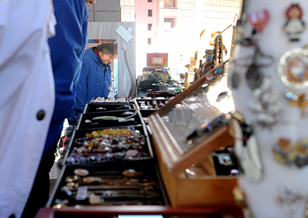 Monthly antique fair chugs on no matter holiday or weather   