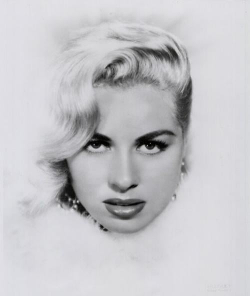 Pinup, B-movie actress Jeanne Carmen dies at 77  