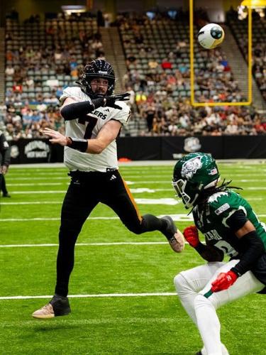 Rattlers quarterback throws a pass against the Green Bay Blizzard in the first half of the Indoor Football Leagfue national championship game on Sunday, Aug. 16, 2026, at Tucson Arena