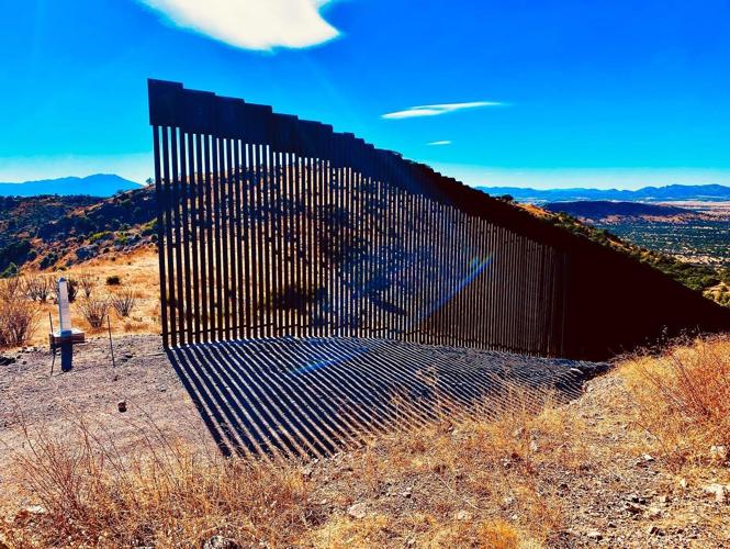 Coronado National Memorial marker and the border wall