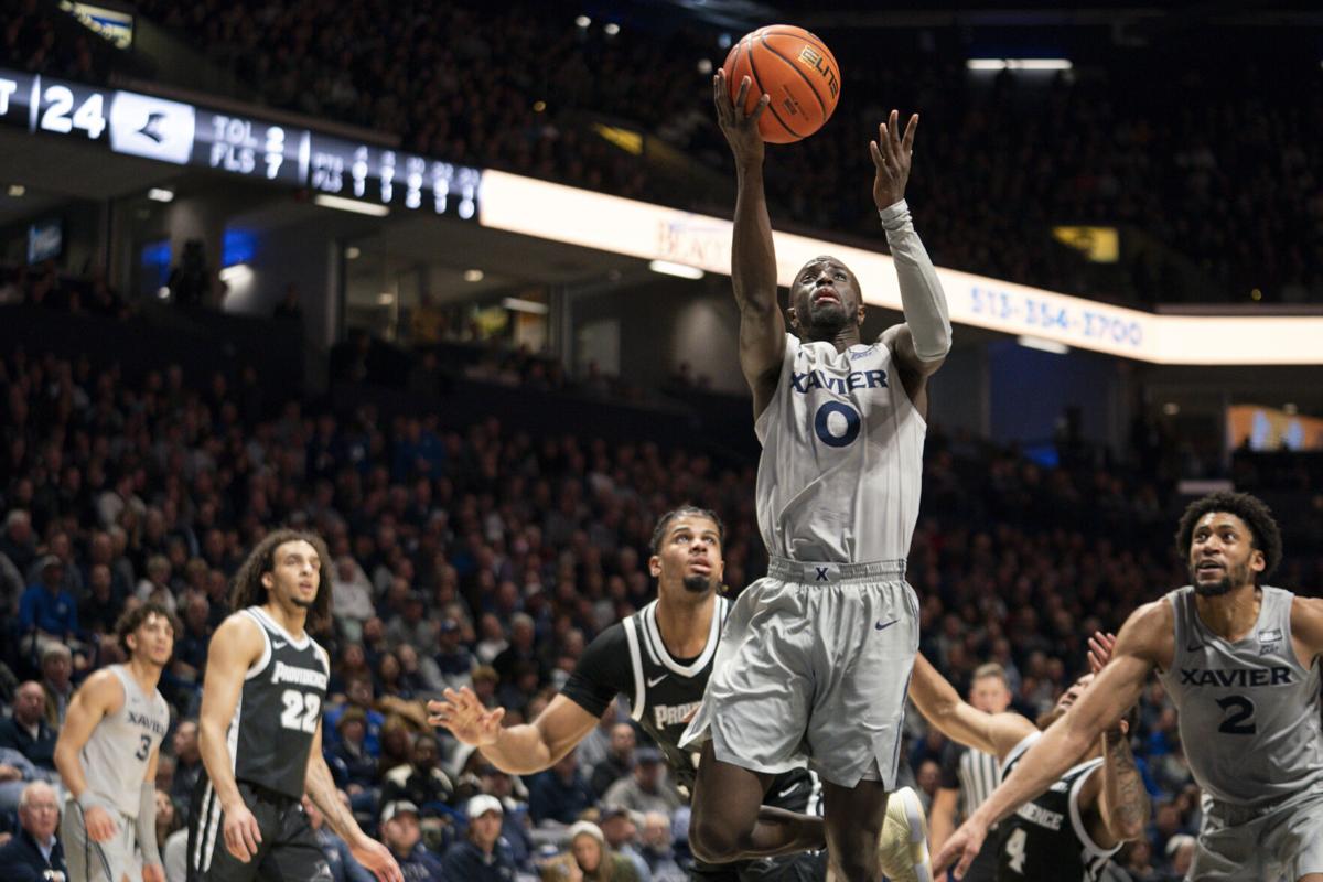 No. 16 Xavier holds off No. 17 Providence in OT