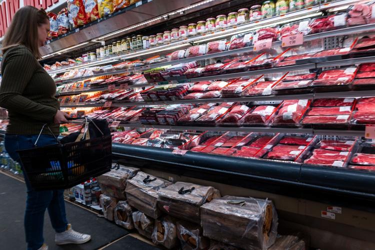 Americans are shelling out for higher gas prices while cutting back on some goods