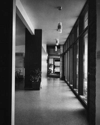 1957 photos: Burnt adobe accents this home