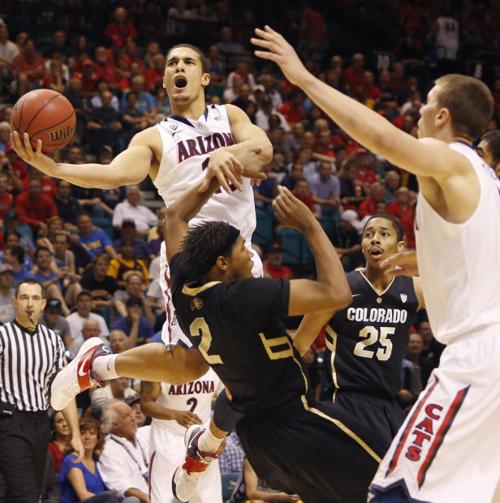 Pac-12 men's basketball tournament: No. 18 Arizona 79, Colorado 69: Buffs out; Bruins next