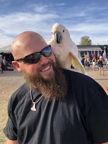 Country fan on his shoulder