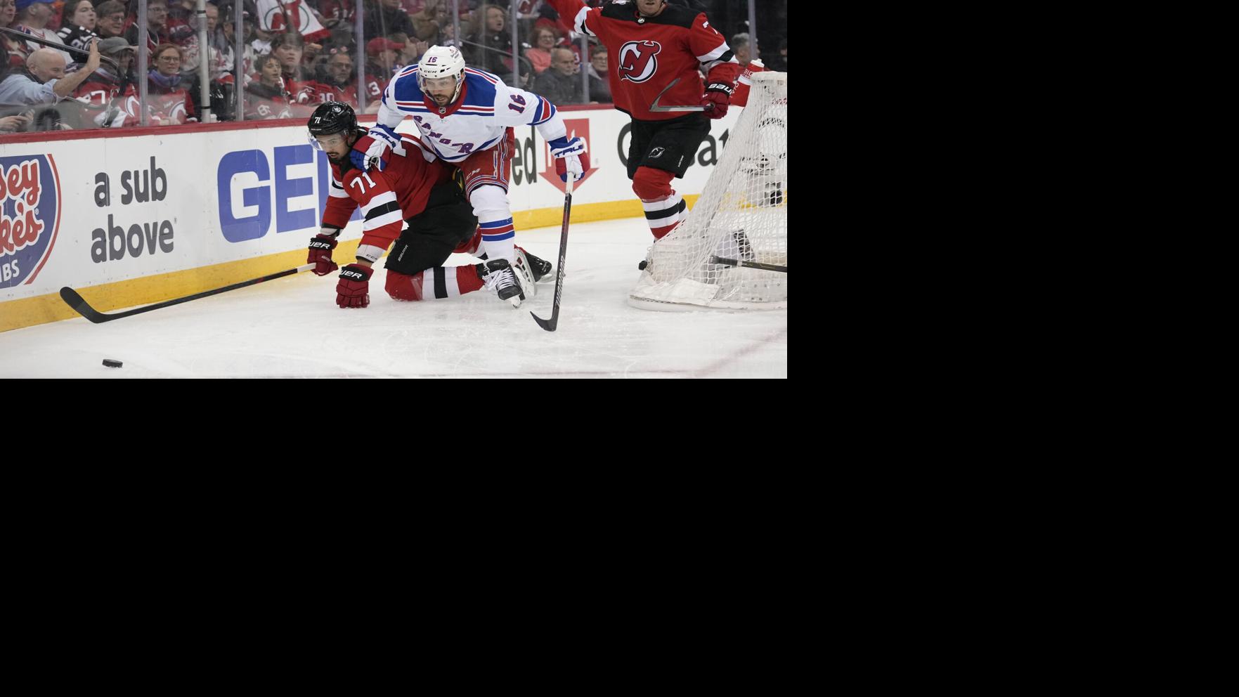 Rangers cruise past Devils in opener