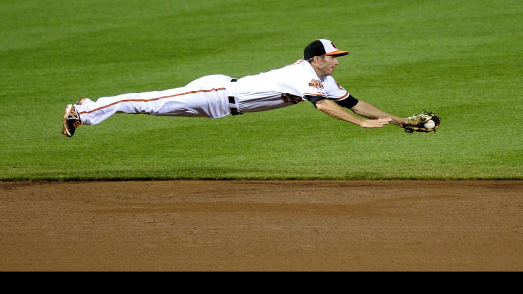 Photo: J.J. Hardy slide in Baltimore, MD - WAG2012090705 