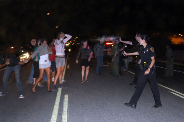 Officers pepper-spray crowd during Tucson traffic stop confrontation