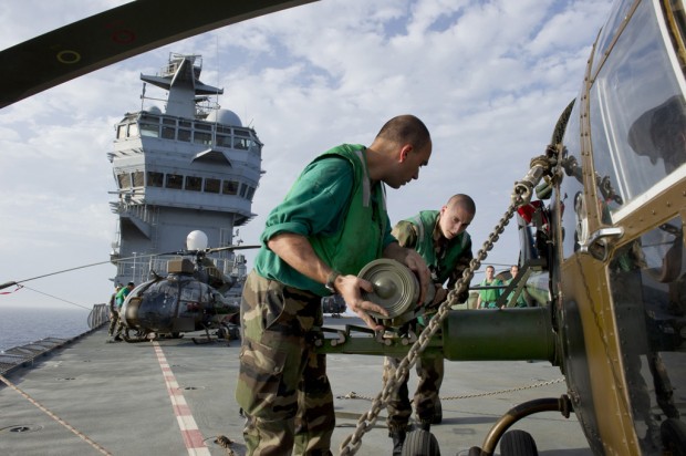 British, French helicopters strike Libyan troops   