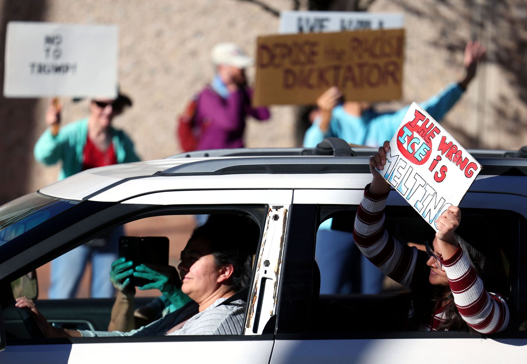 Hundreds gather for 'people power' show of opposition to Trump in Tucson
