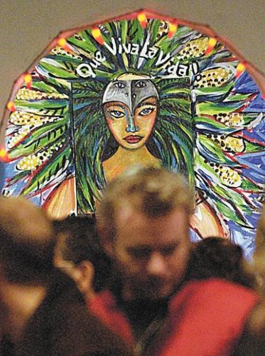 Blindness gags help keep muralist going  