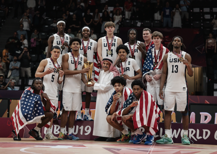 Koa Peat, Tommy Lloyd and Team USA with U19 World Cup trophy