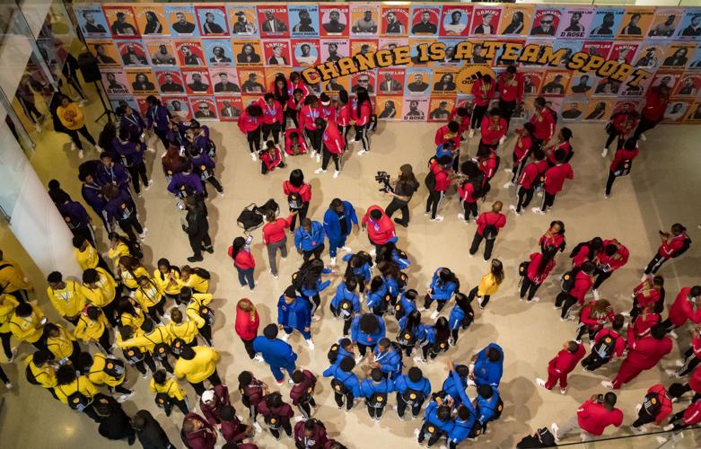 Students divide into groups.