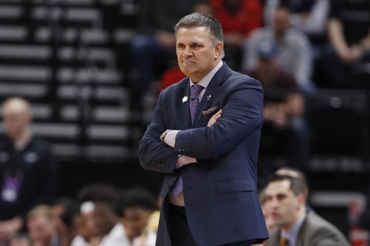 NNCAA New Mexico Auburn Basketball