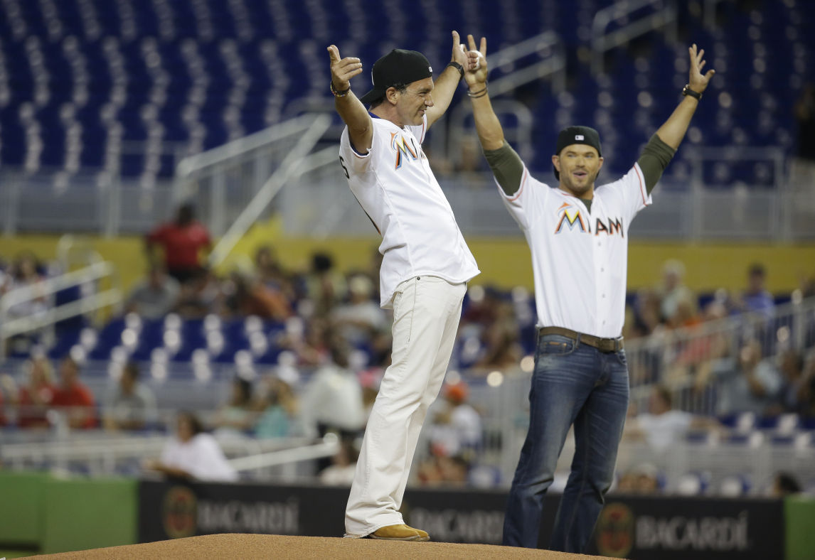 Kellan Lutz and Antonio Banderas throw ceremonial first pitch at