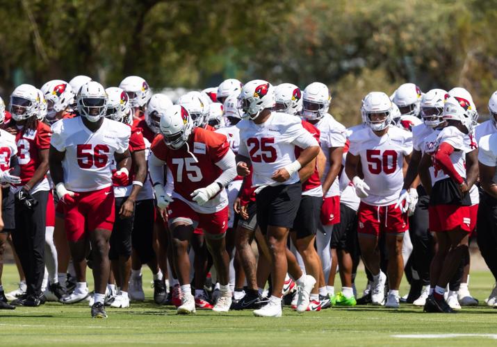 Jun 10, 2025; Tempe, AZ, USA; Arizona Cardinals defensive lineman Darius Robinson (56), offensive lineman Christian Jones (75) and linebacker Zaven Collins (25) with teammates during minicamp at the teams Arizona Cardinals Training Facility. Mandatory Cred
