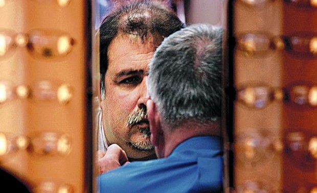 Blindness gags help keep muralist going  