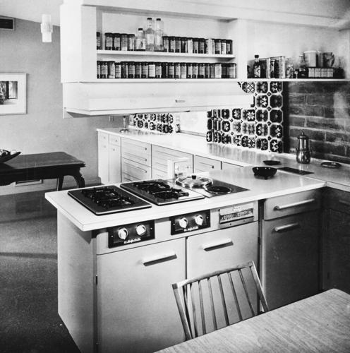 1957 photos: Burnt adobe accents this home