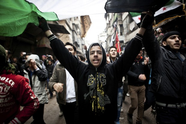 Civilians flee battle over Syrian military complex    