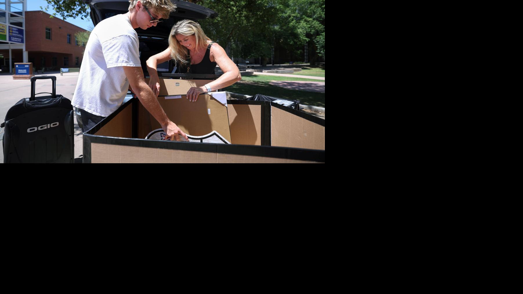 Photos: Students return to University of Arizona on dorm move-in day