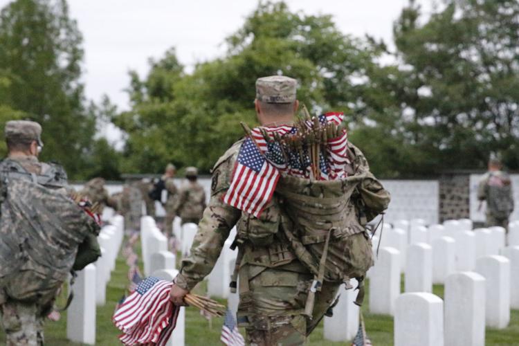 ‘Flags-in’ event prepares Arlington for Memorial Day