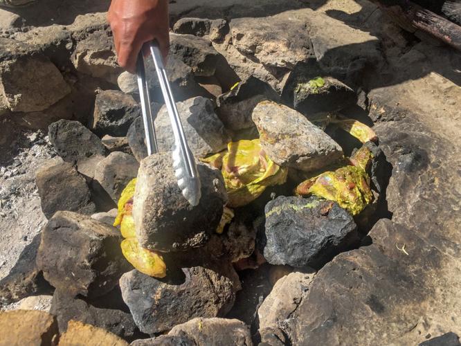 Marinated lamb, chicken and pork are placed directly onto scalding-hot stones to cook with the pachamanca.