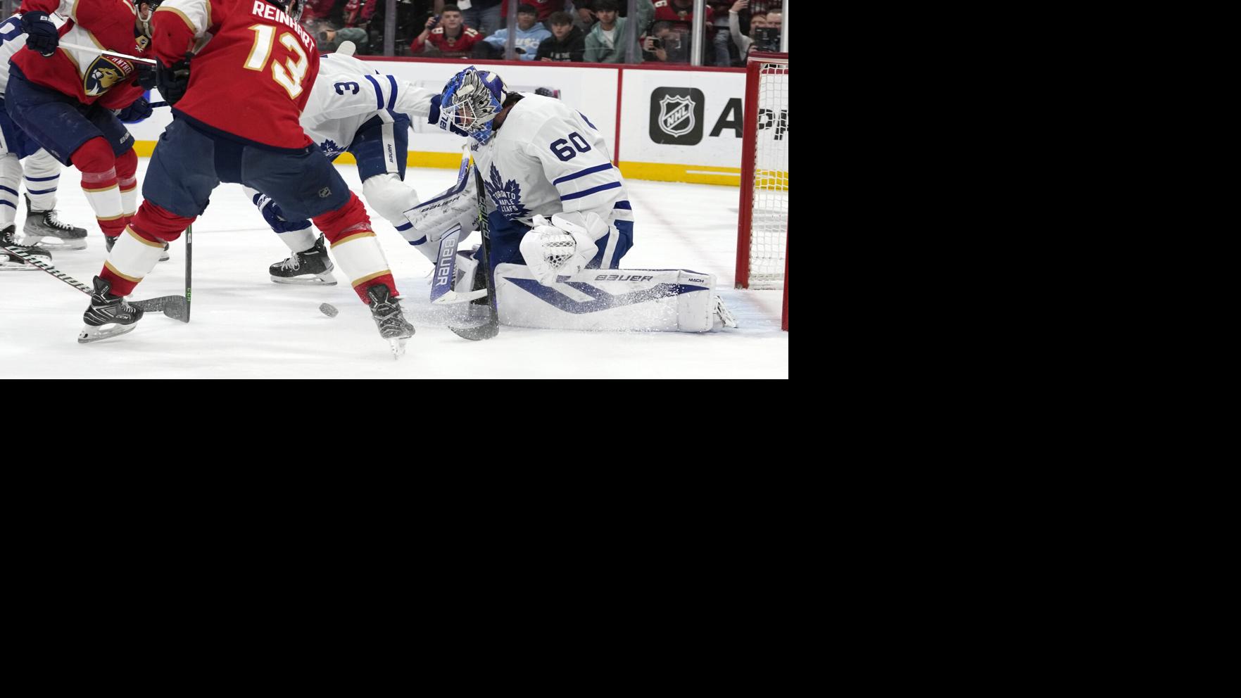 Woll stops 24, Maple Leafs avoid elimination