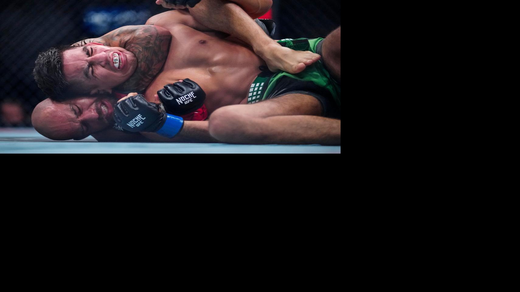 Jean Silva uses a chokehold to force a tap-out from Jose Miguel Delgado during Noche UFC at Desert Diamond Arena in Glendale, on
