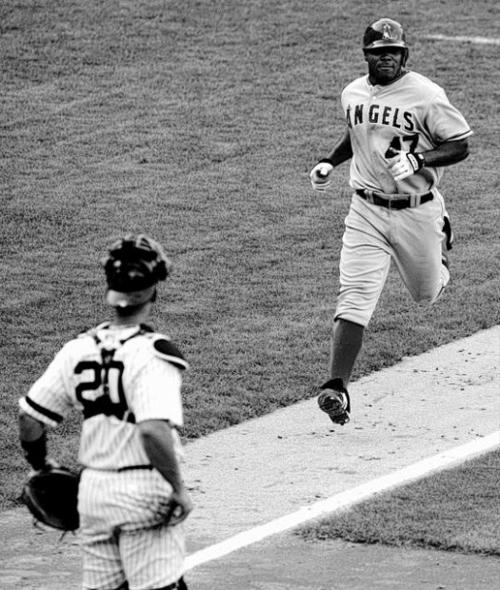 Angels capitalize on errors in 13th  