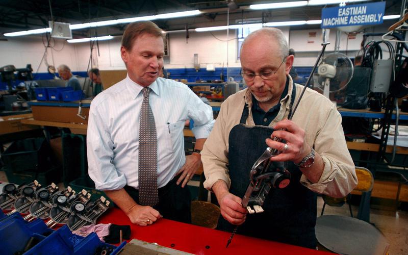 Eastman Machine Robert Stevenson, left, president and chief executive officer, with an employee at Eastman Machine in Buffalo, N.Y.