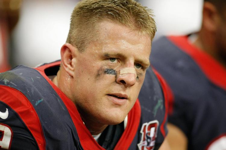 Oct 14, 2012; Houston, TX, USA; Houston Texans defensive end J.J. Watt (99) shows emotion during a game against the Green Bay Packers in the third quarter at Reliant Stadium. The Packers defeated the Texans 42-24. Mandatory Credit: Brett Davis-USA TODAY Sp
