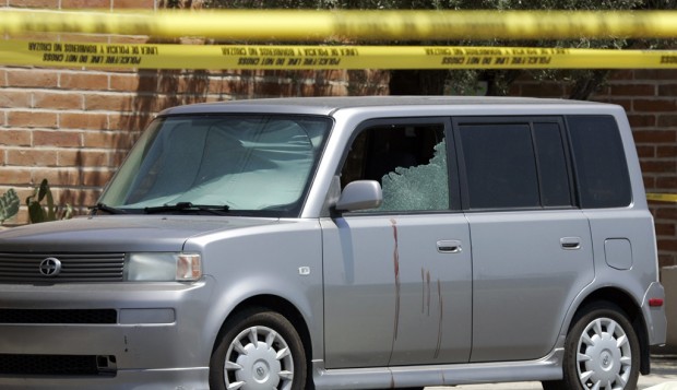 Woman in car is shot dead by spouse who then kills self    