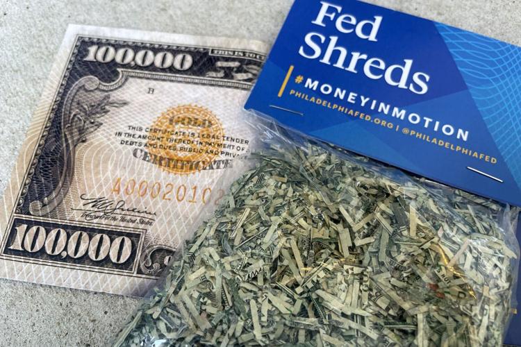 A bag of“ Fed Shreds” given free to each visitor at the newly redesigned“ Money in Motion” exhibit at the Federal Reserve Bank of Philadelphia Thursday, May 7, 2026.