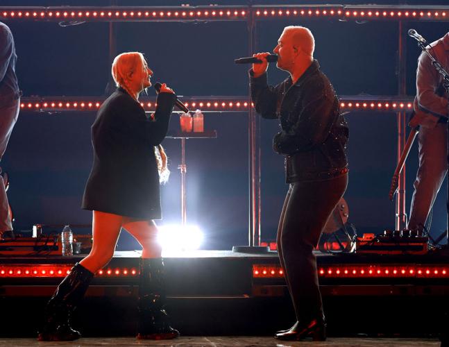Kim Petras, left, and Sam Smith perform onstage during the 2022 iHeartRadio Music Festival at T-Mobile Arena on Sept. 23, 2022, in Las Vegas.