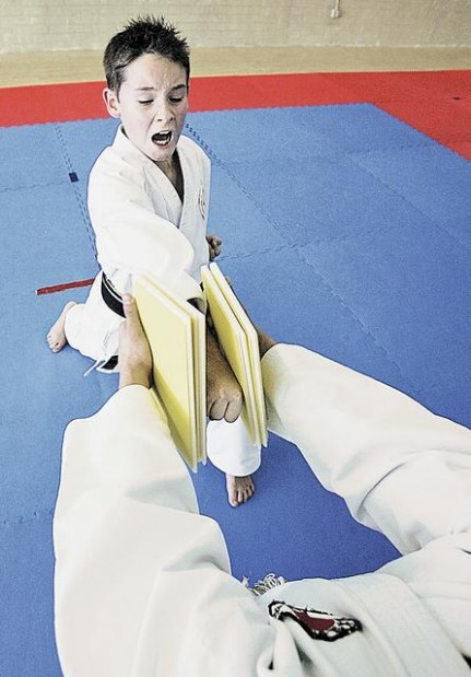 Karate champ finds discipline rewarding  
