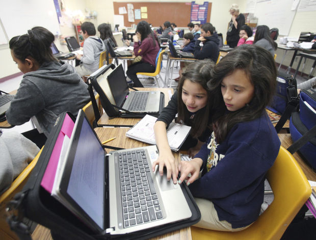 Tech firm helps district with computer lessons    