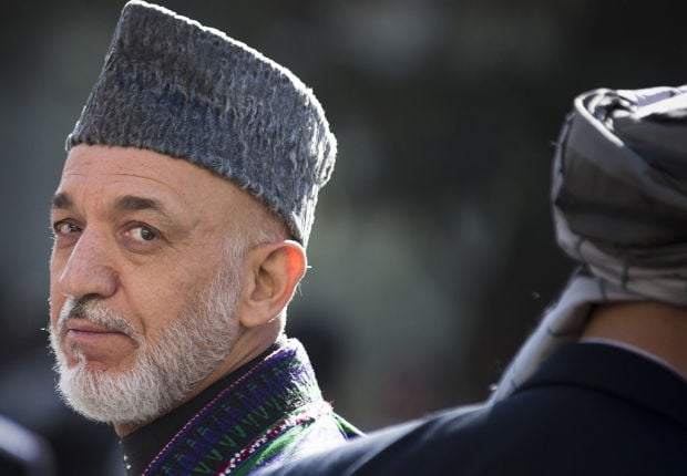 Karzai says he'll curb coalition airstrikes    