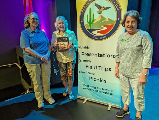 March-2026-Presenter-Renee-Lizotte-raffle-winner-Ginny-Schneider-and-club-Program-Director-Carole-Chase.jpg