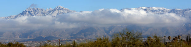 Snow falls in Tucson area