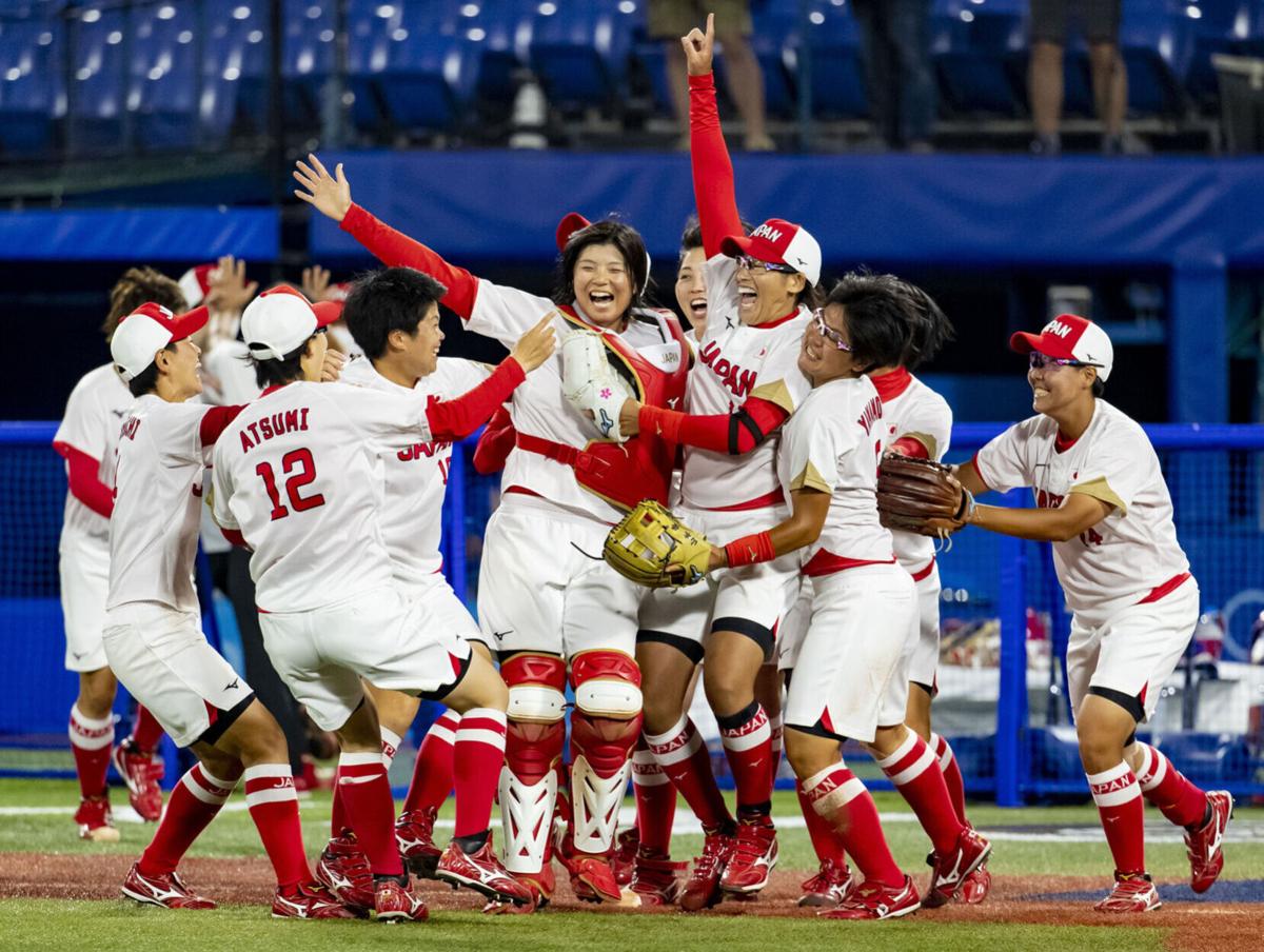 Japan celebrates as they win the the gold medal in softball over the United States on Tuesday, July 27, 2021 in the gold medal game at Yokohama Baseball Stadium during the Tokyo Olympics.