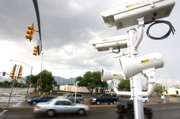 Bill redefines 'intersection' to counter red-light violations    