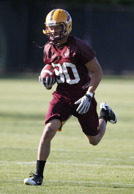 Patrick Finley: Holliday picks real world over gridiron    