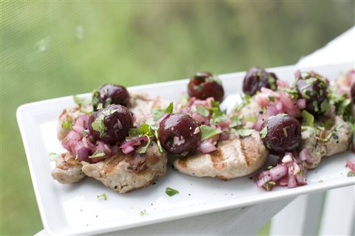 Pork with a fresh take on salsa _ grilled cherries