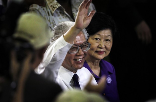 After unexpectedly fierce race, Singapore gains new president   